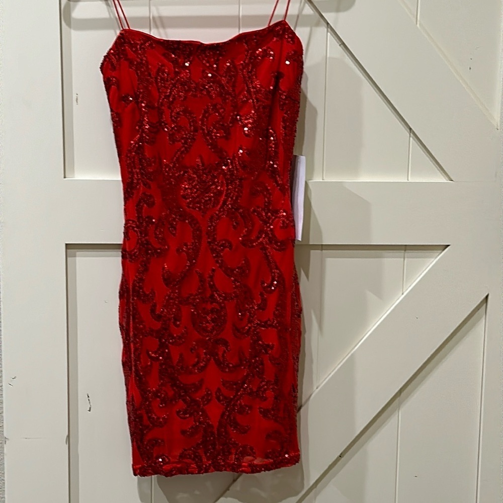 NWT Formal sequin dress. Pit is 16” & stretches to 18”. Length is 34 1/2” medium
